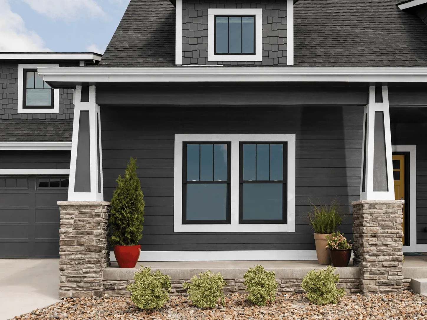 Double hung replacement windows in close exterior detail